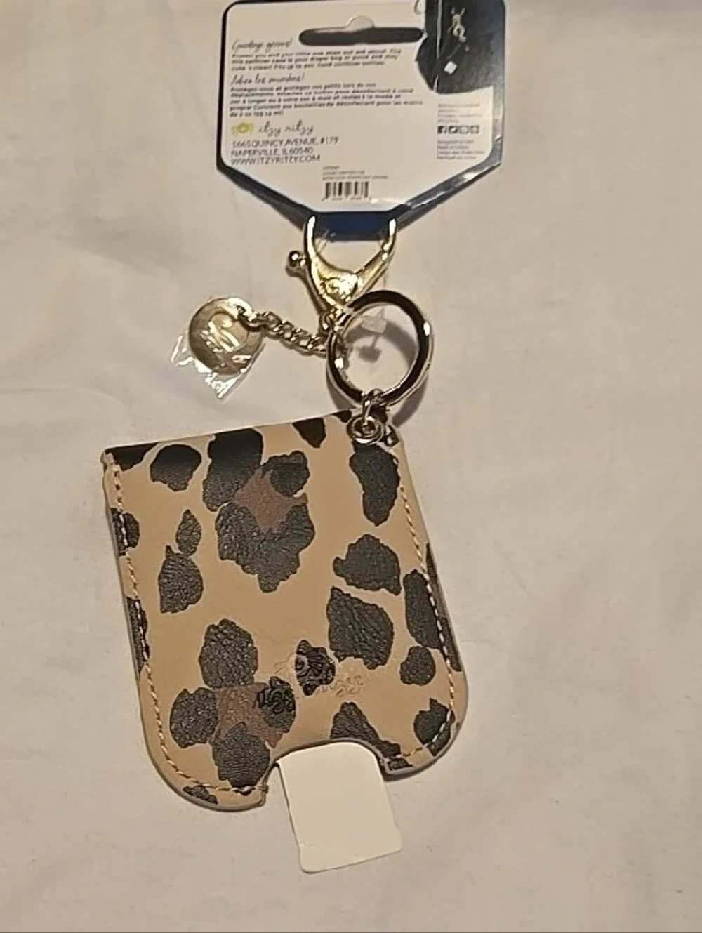 Itzy Ritzy Leopard Print Hand Sanitizer Holster - Beige & Black